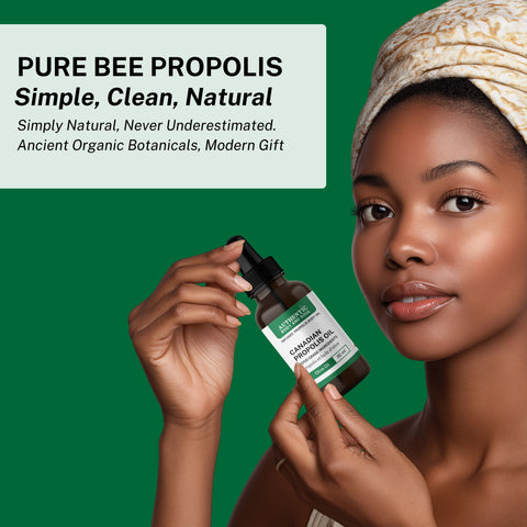 Woman holding a bottle of pure bee propolis product with a green background